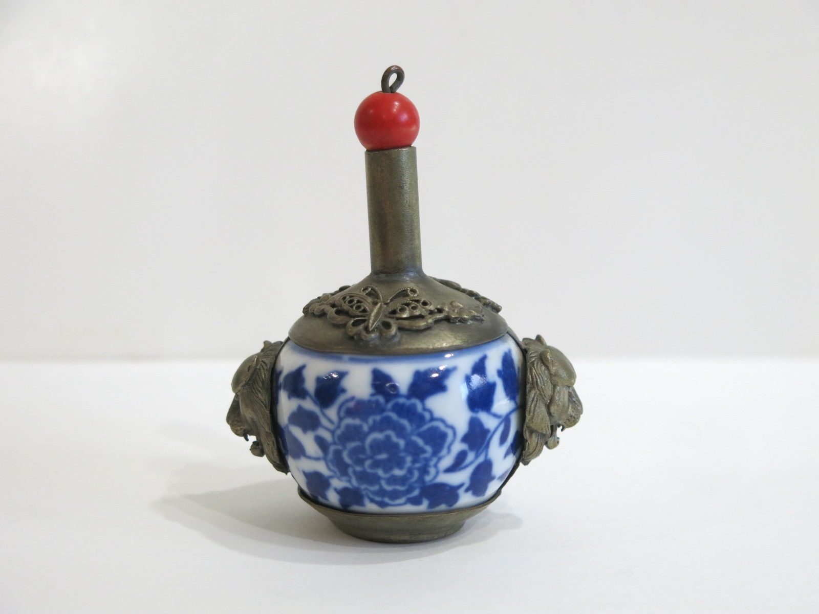 Chinese Snuff Bottle Porcelain with Silver Chased Lid and Lion Head