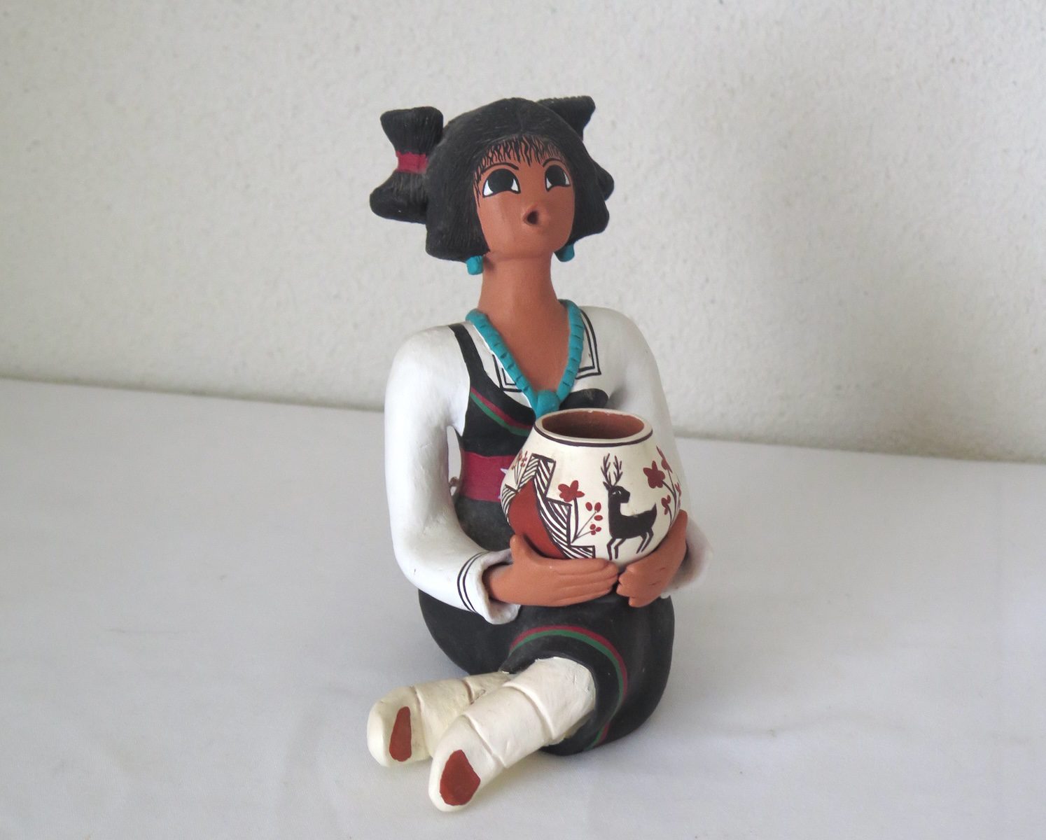 Ceramic Acoma Storyteller Maiden with Pot by Rachel Arnold